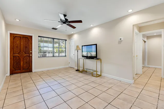 a view of livingroom with furniture and windows