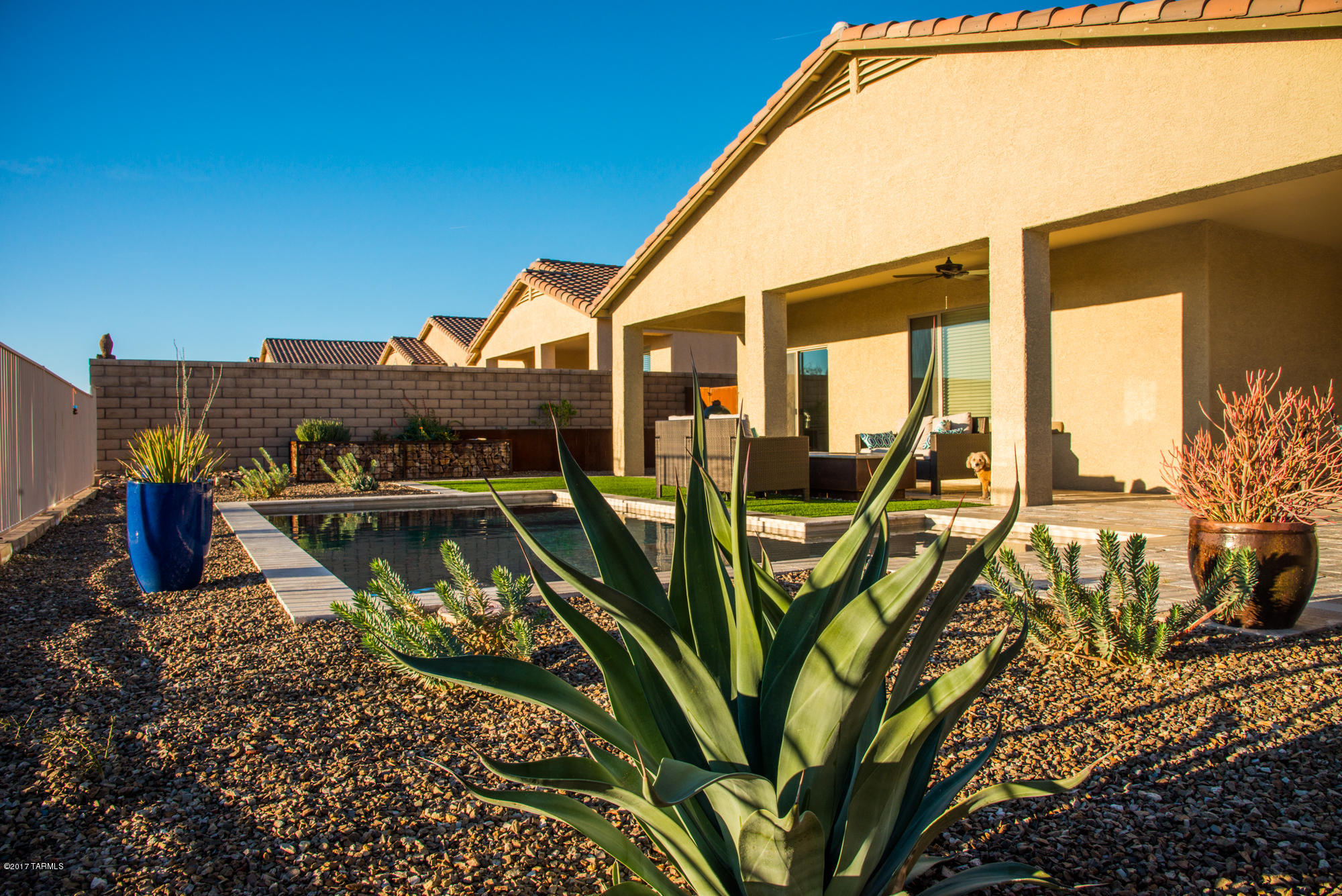 4405 West Crystal Ranch Place Marana, AZ 85658 - Photo 15 of 44 a view of a house with a backyard