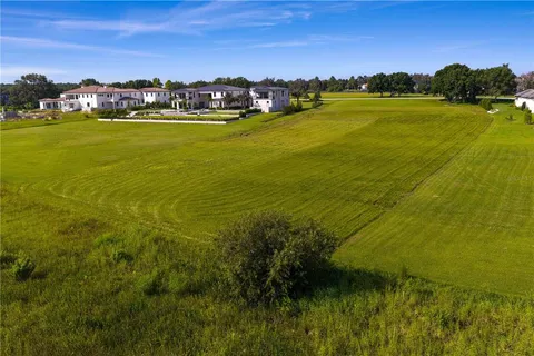 a view of a lake with a houses