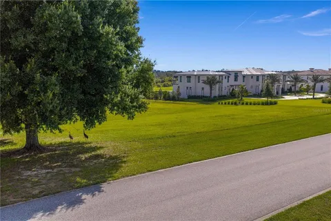 a view of field with ocean view