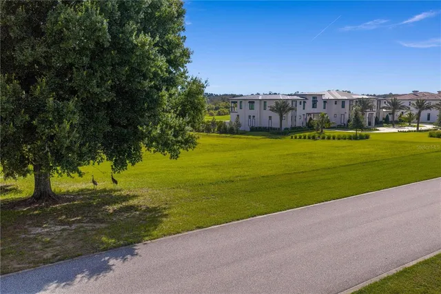 a view of field with ocean view