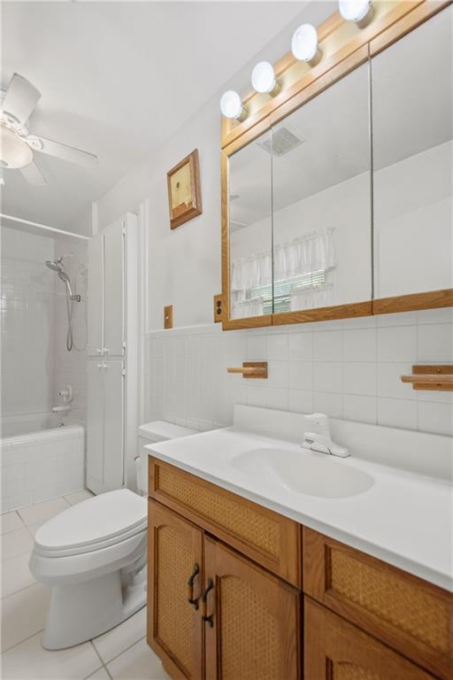 3749 Centerville Rosebud Road Snellville, GA 30039 - Photo 29 of 77 a bathroom with a sink a toilet and shower