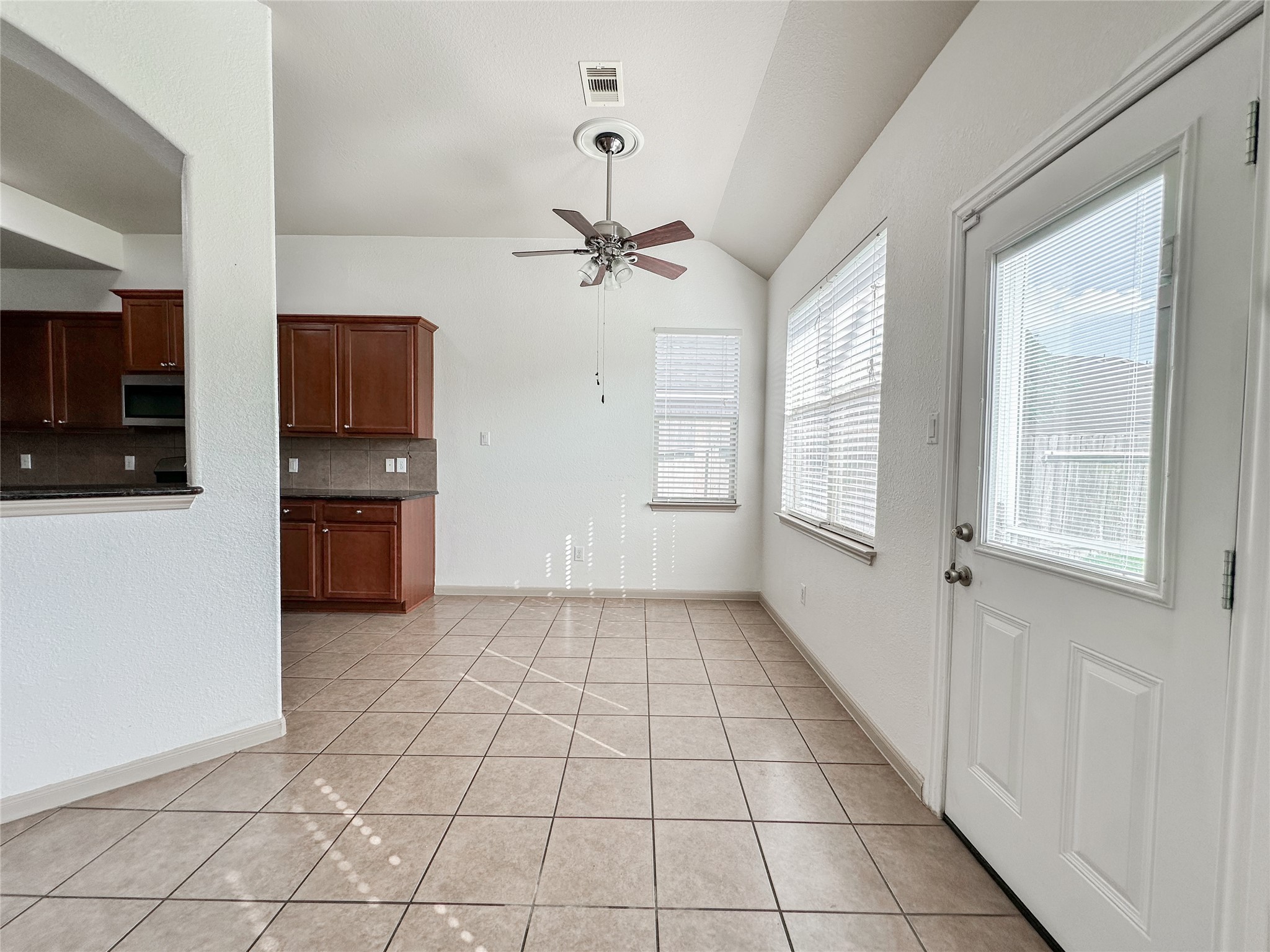 20319 Little Wing Drive Spring, TX 77388 - Photo 22 of 49 a view of an empty room with cabinet and a flat screen tv