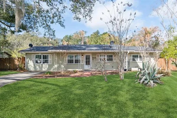 front view of a house with a yard