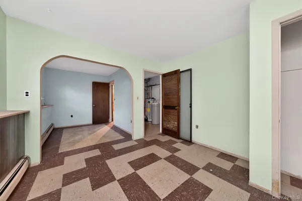 a view of a bedroom with a wardrobe