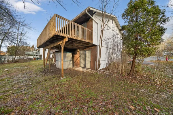 a house with trees in the background