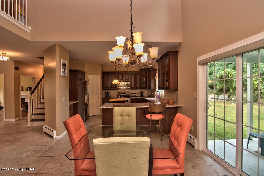 2169 Fox Run Road Stroudsburg, PA 18360 - Photo 26 of 66 a view of a dining room with furniture window and outside view