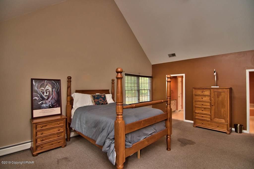 2169 Fox Run Road Stroudsburg, PA 18360 - Photo 28 of 66 a bedroom with a bed and a window