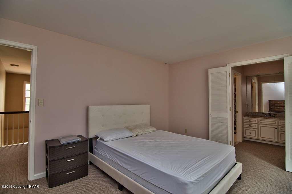 2169 Fox Run Road Stroudsburg, PA 18360 - Photo 45 of 66 a bedroom with a bed and dresser