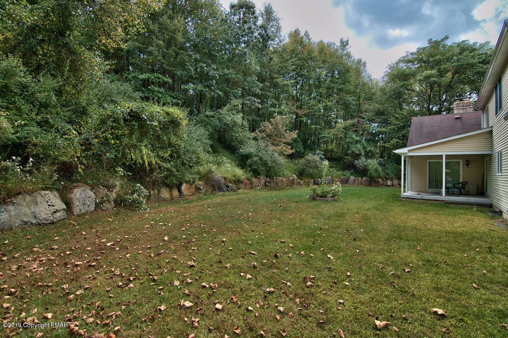 2169 Fox Run Road Stroudsburg, PA 18360 - Photo 61 of 66 a view of a house with a yard