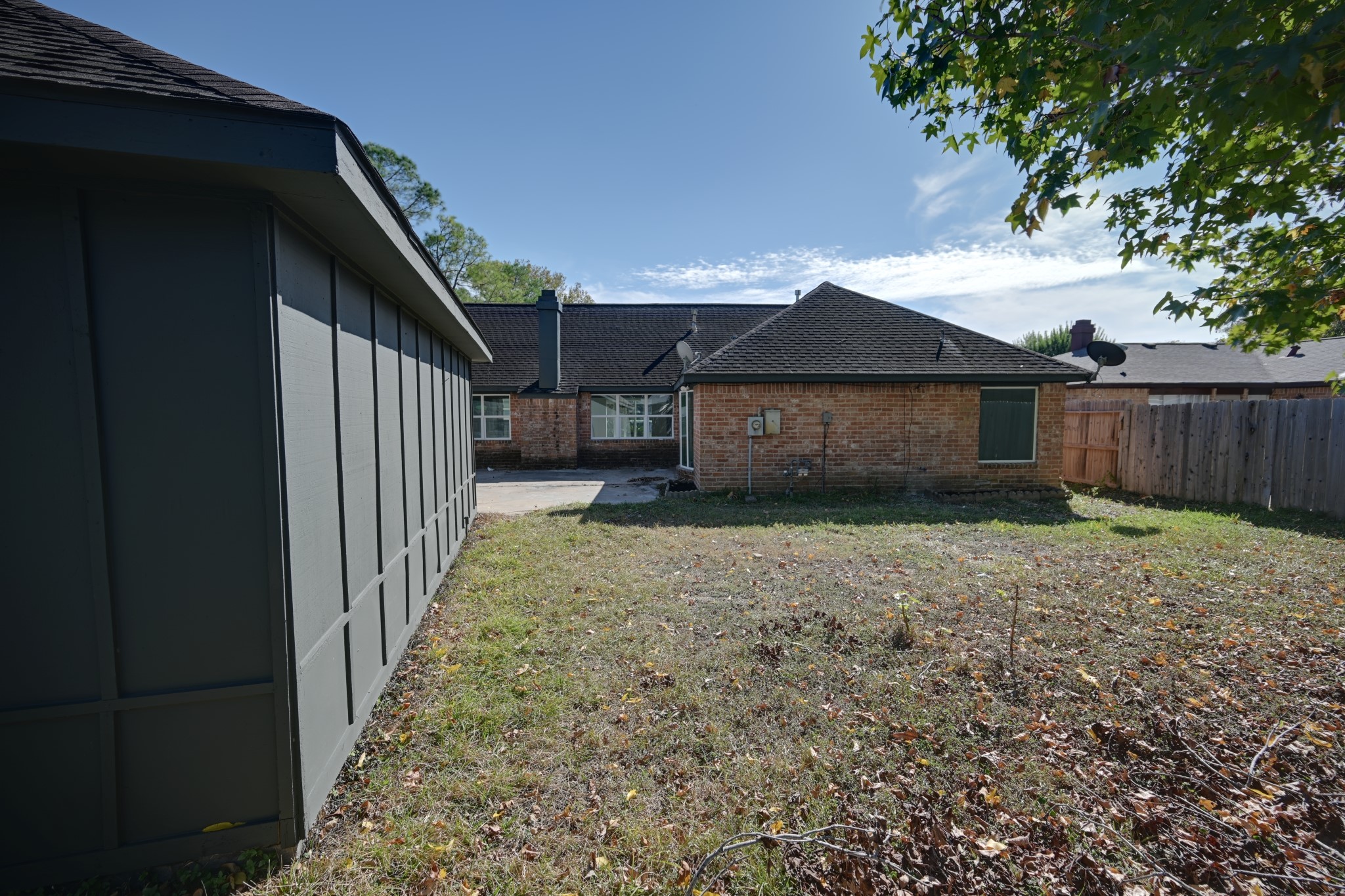 10410 Cook Road Houston, TX 77099 - Photo 11 of 14 a front view of a house with a garden