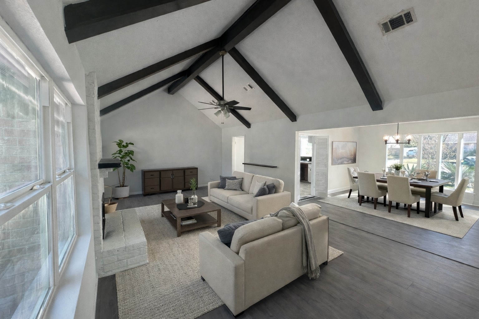 10410 Cook Road Houston, TX 77099 - Photo 6 of 14 a living room with furniture and a chandelier