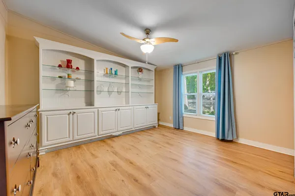 a view of a car park in front of a house