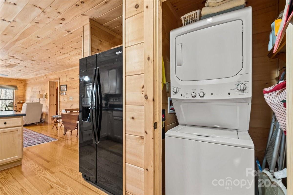 440 Jervey Road Landrum, SC 29356 - Photo 24 of 29 a view of washer and dryer with bathroom in the background