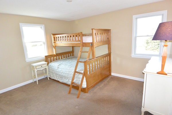 257 Neck Road Lancaster, MA 01523 - Photo 13 of 28 a bedroom with furniture and window
