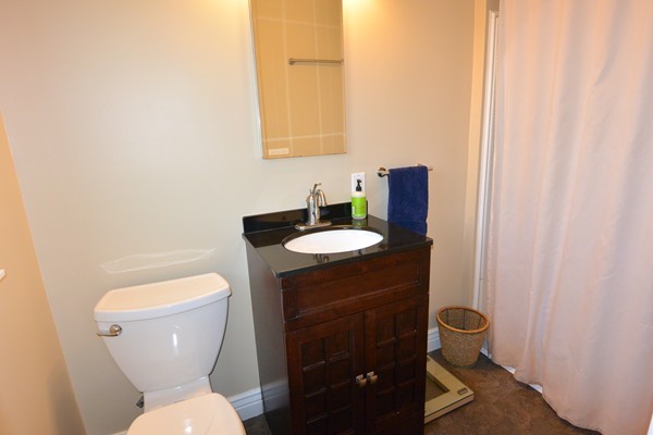 257 Neck Road Lancaster, MA 01523 - Photo 15 of 28 a bathroom with a toilet a sink and mirror