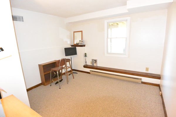 257 Neck Road Lancaster, MA 01523 - Photo 20 of 28 a view of a workspace with furniture and a window