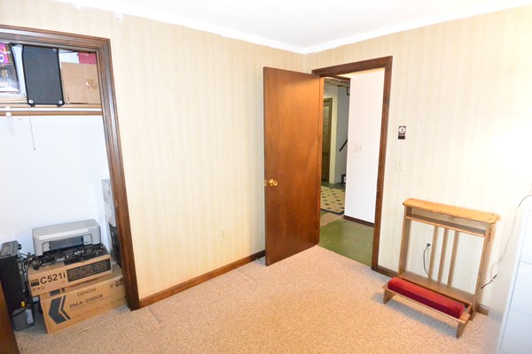 257 Neck Road Lancaster, MA 01523 - Photo 21 of 28 a bedroom with a bed and a window