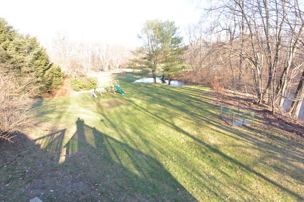 257 Neck Road Lancaster, MA 01523 - Photo 25 of 28 a view of yard with trees