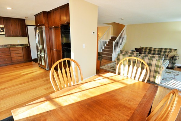 257 Neck Road Lancaster, MA 01523 - Photo 6 of 28 a view of a bedroom with wooden floor