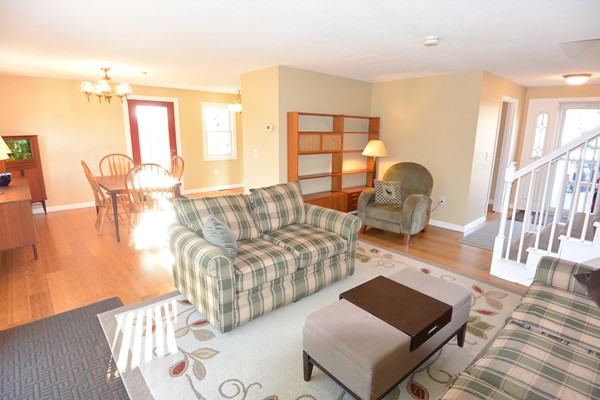 257 Neck Road Lancaster, MA 01523 - Photo 8 of 28 a living room with furniture and wooden floor