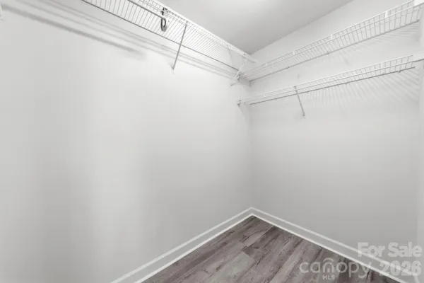 a view of a room with racks on the wall