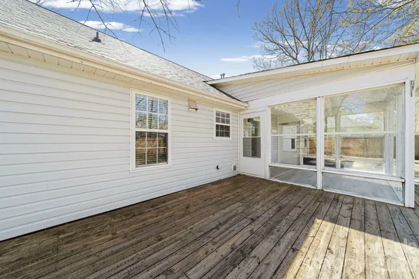 a view of a house with a large window