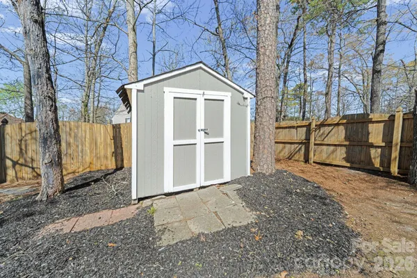 a view of backyard of house