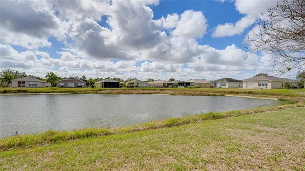 a view of a lake with houses