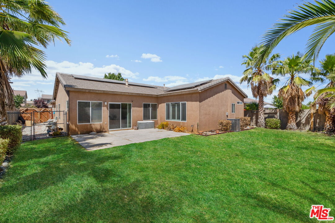 13623 Fox Point Road Victorville, CA 92392 - Photo 25 of 33 a front view of house with yard and outdoor seating