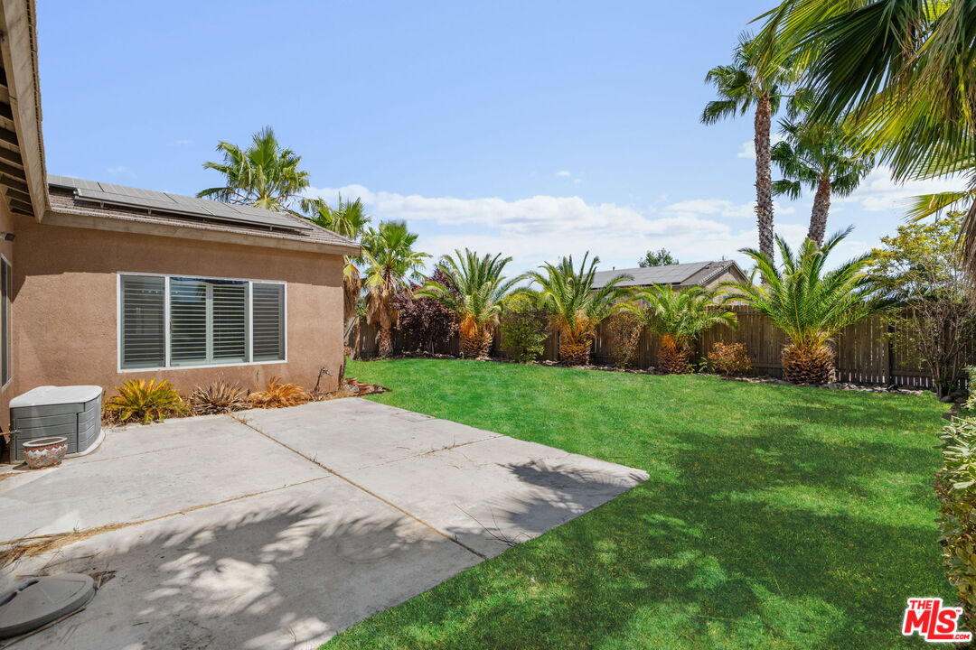 13623 Fox Point Road Victorville, CA 92392 - Photo 26 of 33 a front view of a house with a yard