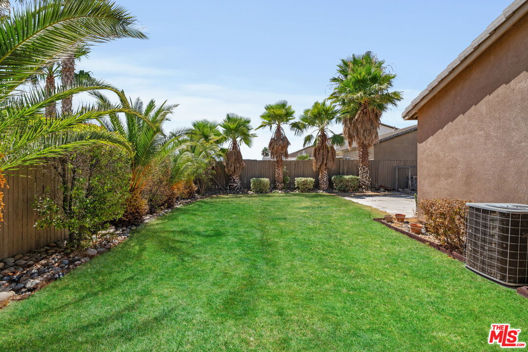 13623 Fox Point Road Victorville, CA 92392 - Photo 27 of 33 a view of a yard with a house