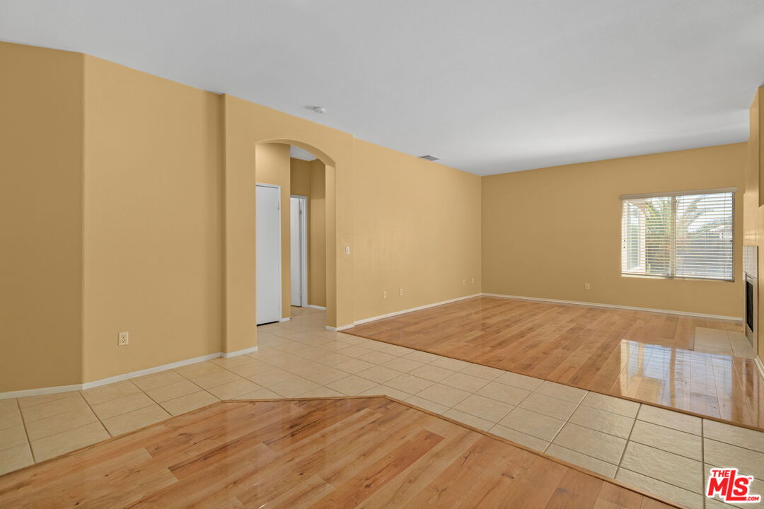 13623 Fox Point Road Victorville, CA 92392 - Photo 7 of 33 a view of an empty room and window