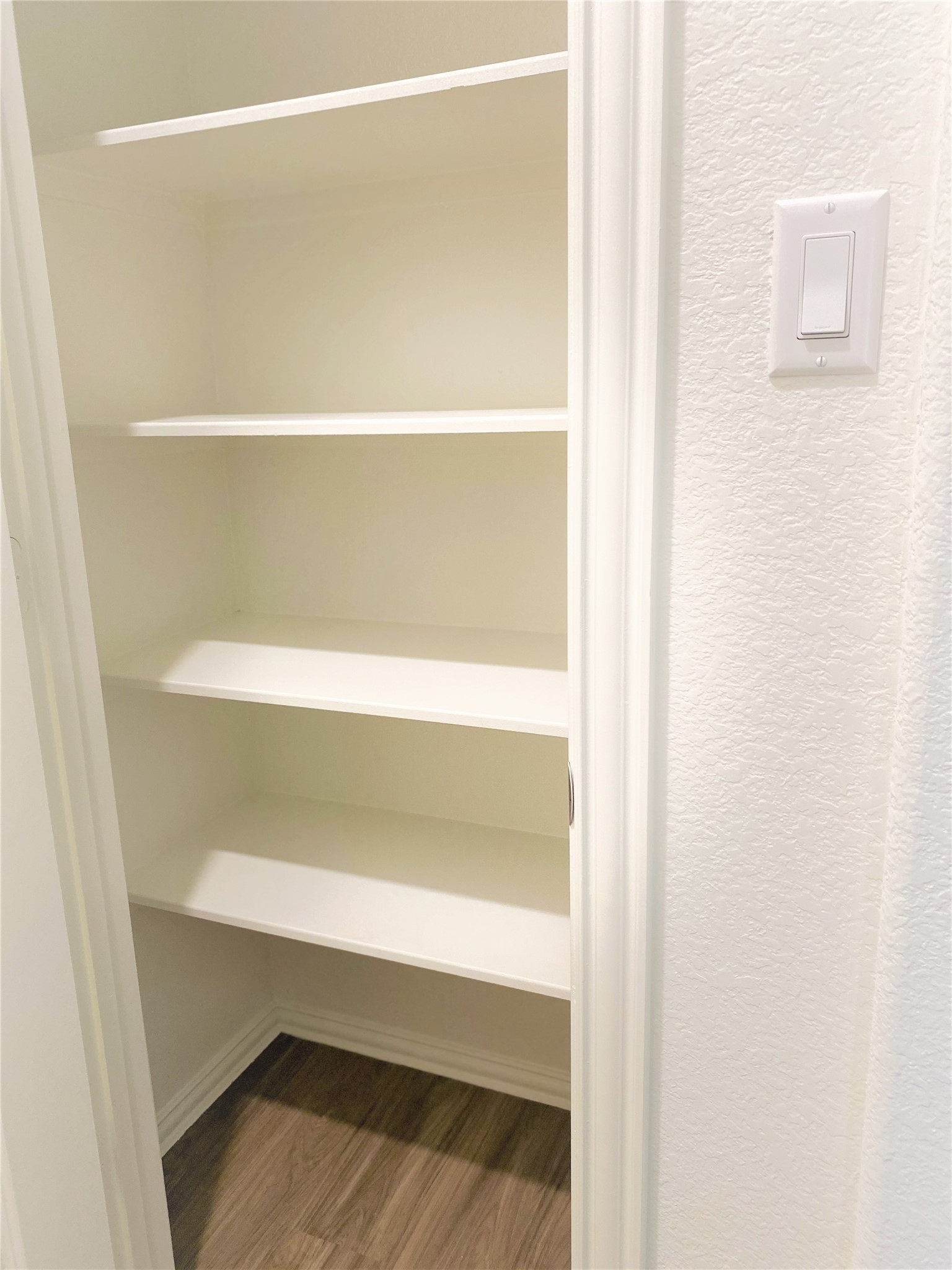 1309 Terrace View Georgetown, TX 78628 - Photo 32 of 36 Ample shelving in this well-appointed closet provides organized storage solutions.