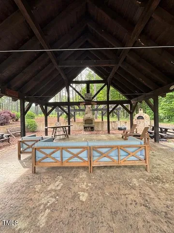 a view of a swimming pool with a sitting space
