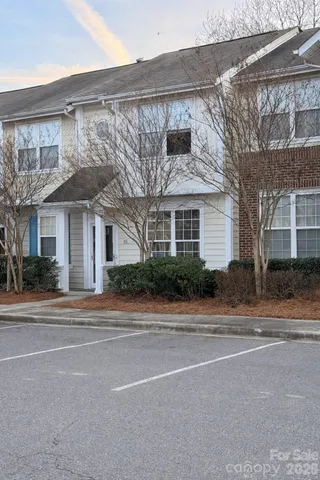 front view of a house with a small yard