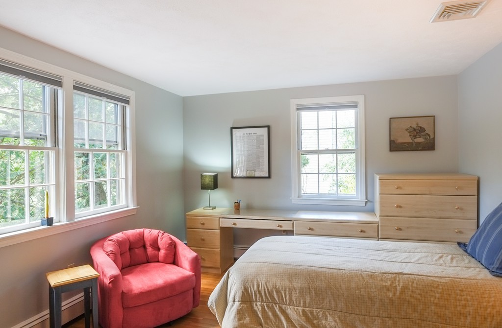 25 Oak Hill Road Wayland, MA 01778 - Photo 17 of 30 a bedroom with a bed and a couch