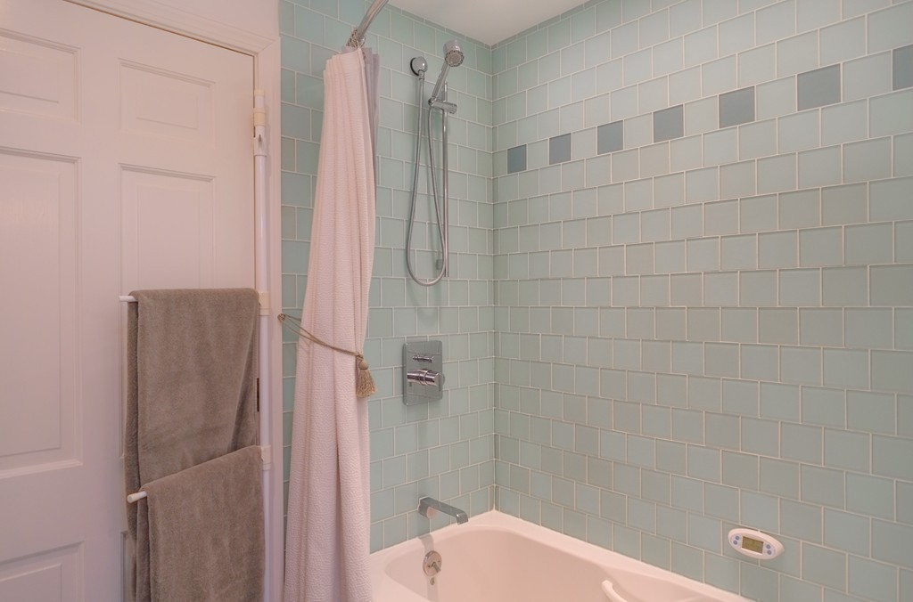 25 Oak Hill Road Wayland, MA 01778 - Photo 21 of 30 a bathroom with a shower and a toilet