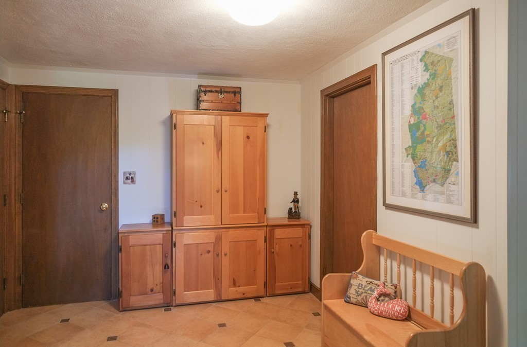 25 Oak Hill Road Wayland, MA 01778 - Photo 23 of 30 a view of a bedroom with a bed and a window