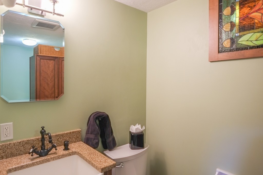 25 Oak Hill Road Wayland, MA 01778 - Photo 24 of 30 a bathroom with a sink and a toilet