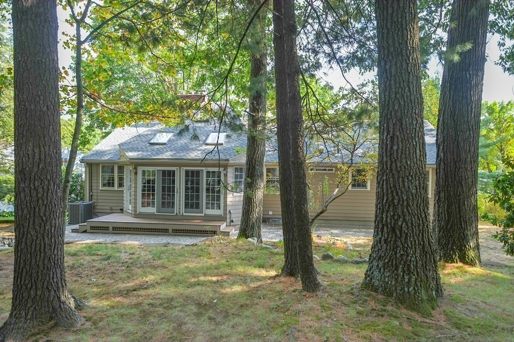 25 Oak Hill Road Wayland, MA 01778 - Photo 27 of 30 a view of a house with backyard and a tree