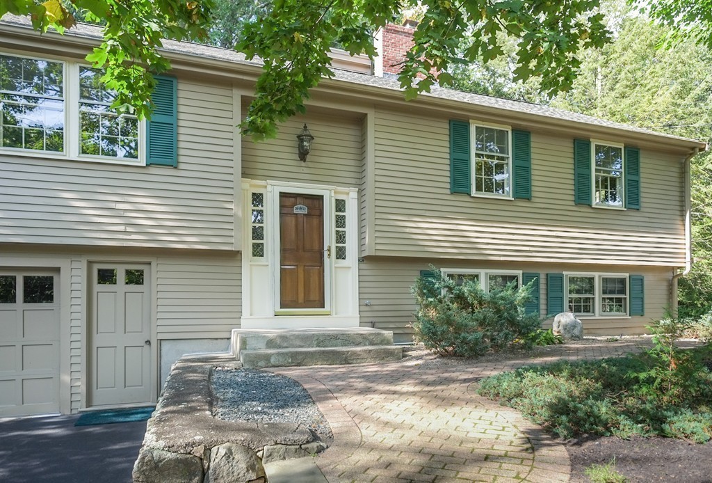 25 Oak Hill Road Wayland, MA 01778 - Photo 30 of 30 a front view of a house with a yard
