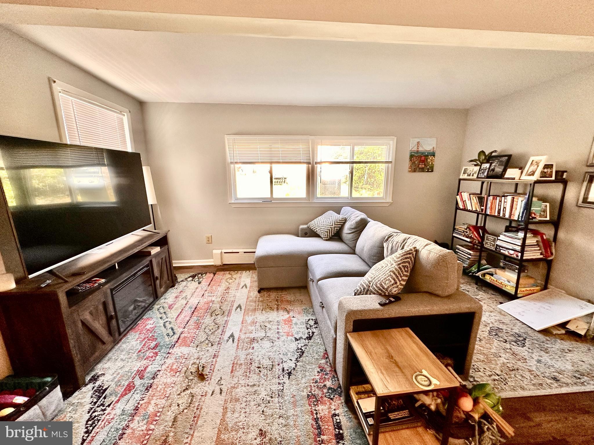 3339 Conrad Street, Unit 1 Philadelphia, PA 19129 - Photo 2 of 13 a living room with furniture and a flat screen tv