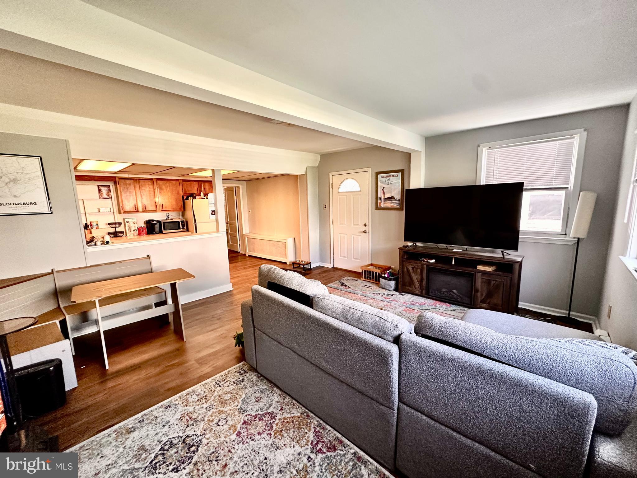 3339 Conrad Street, Unit 1 Philadelphia, PA 19129 - Photo 3 of 13 a living room with furniture and a flat screen tv