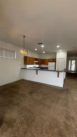 a view of a kitchen with a sink