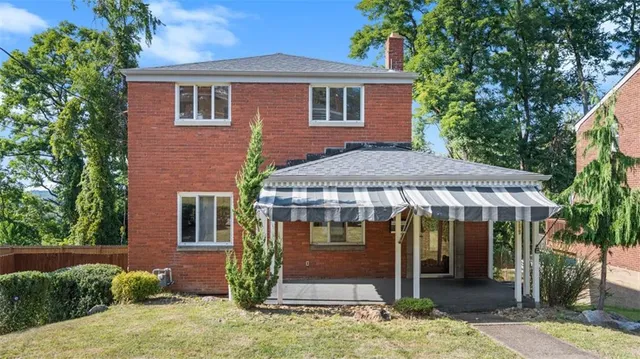 a front view of a house with porch
