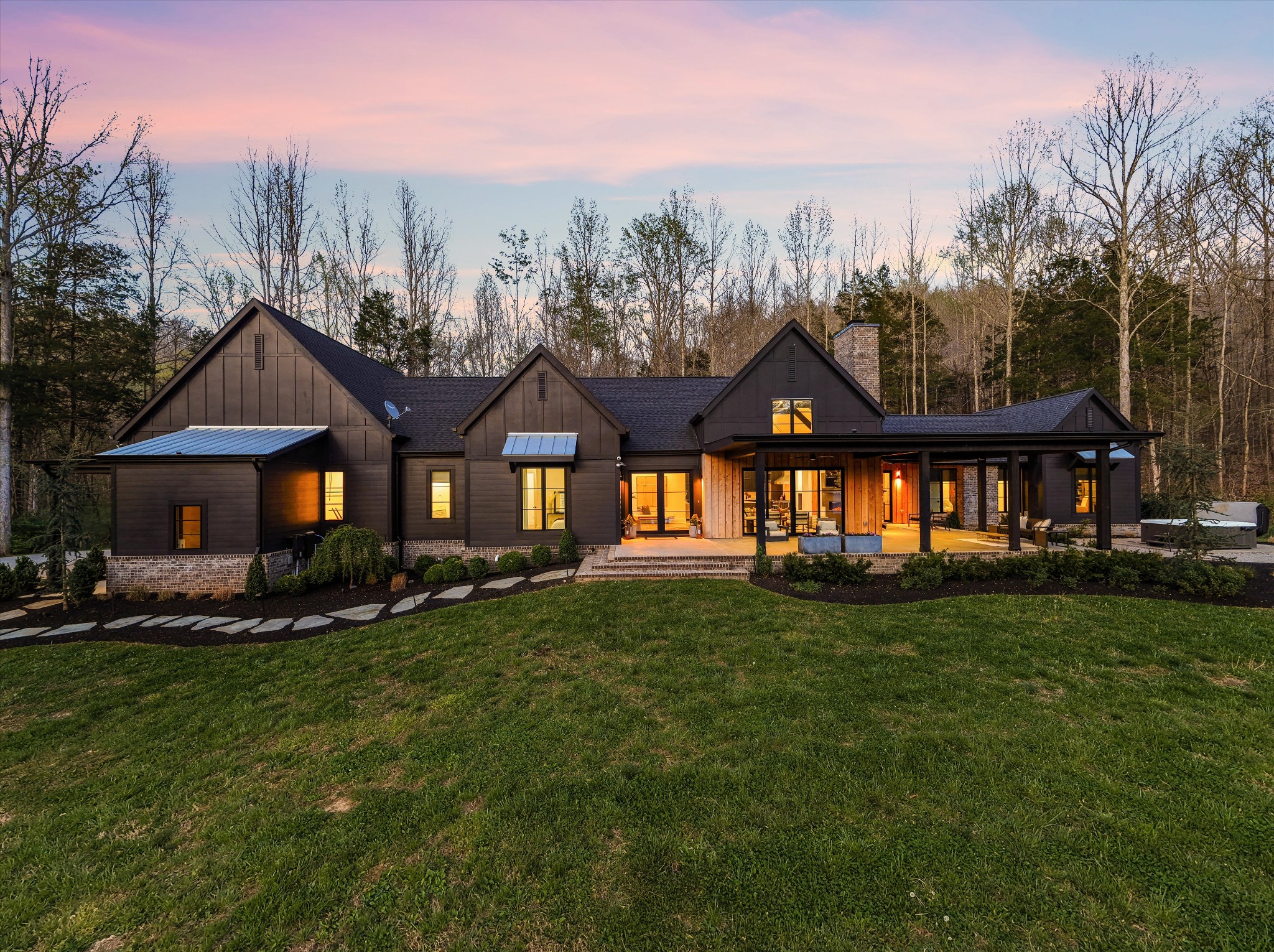 5620 Big East Fork Road Franklin, TN 37064 - Photo 1 of 70 a front view of a house with a yard