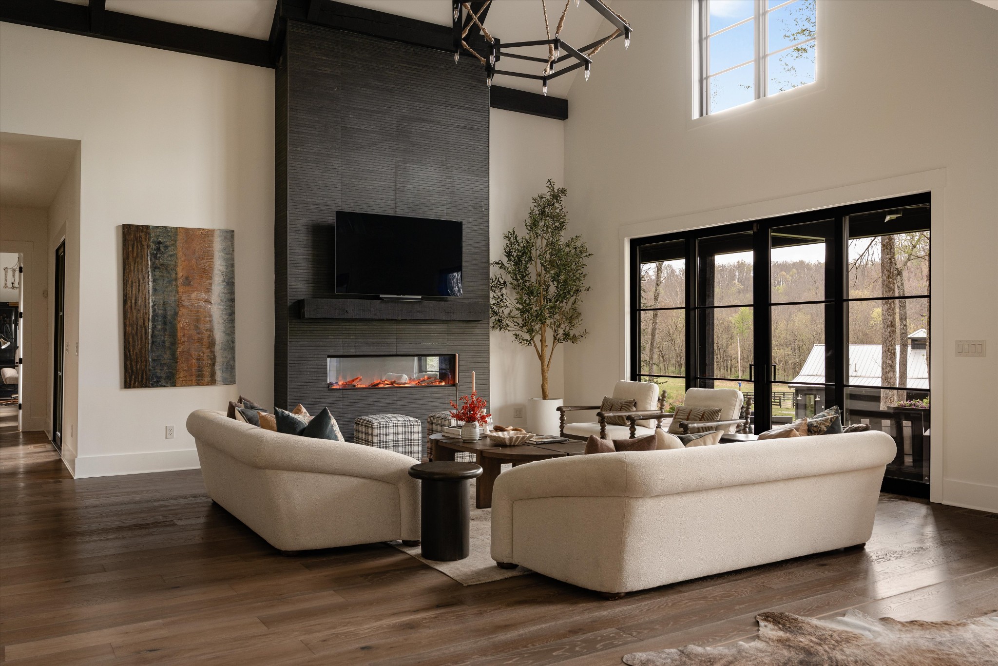 5620 Big East Fork Road Franklin, TN 37064 - Photo 10 of 70 a living room with fireplace furniture and a flat screen tv