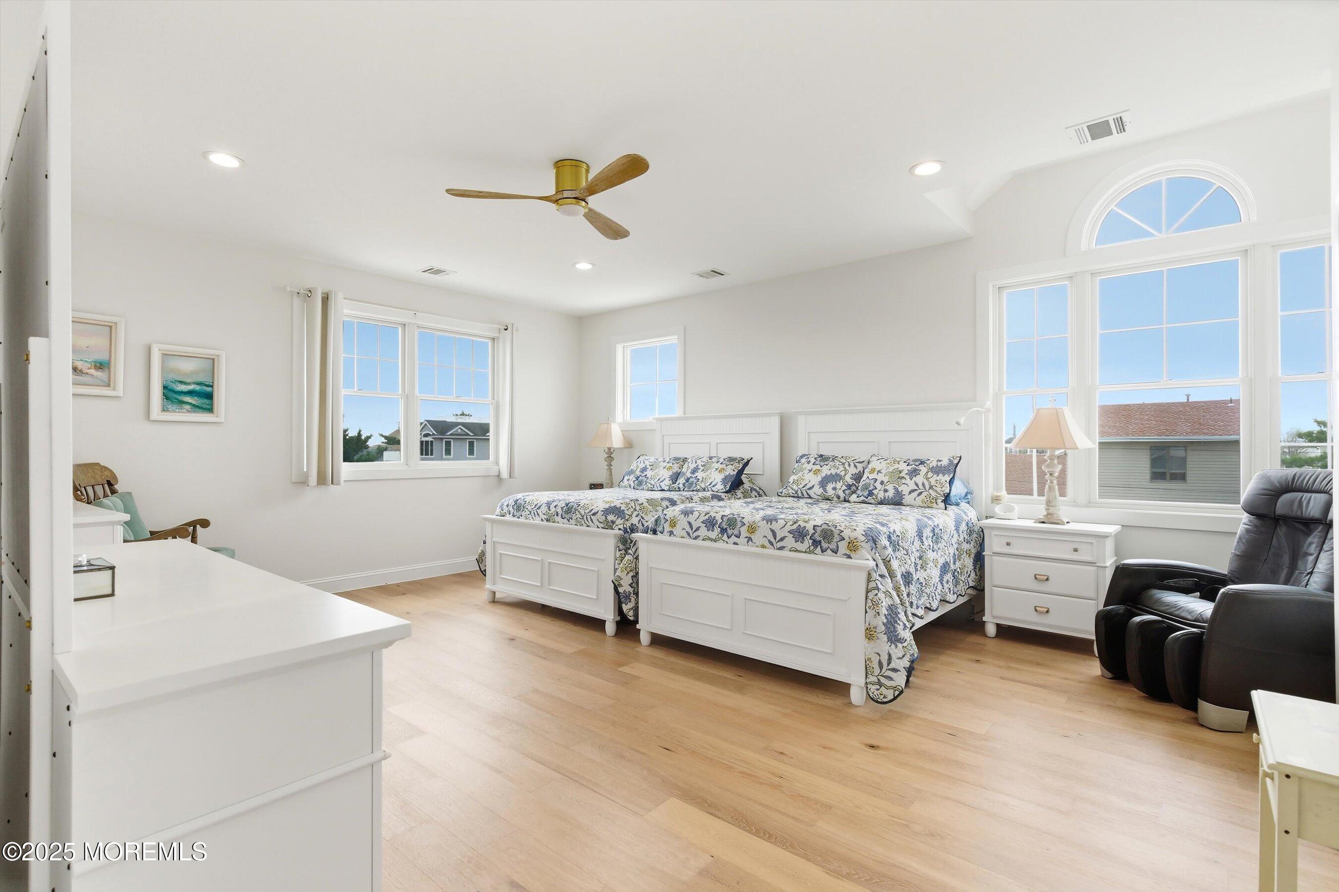 7 East Lavenia Avenue Beach Haven, NJ 08008 - Photo 20 of 48 a bed room with furniture and a large window