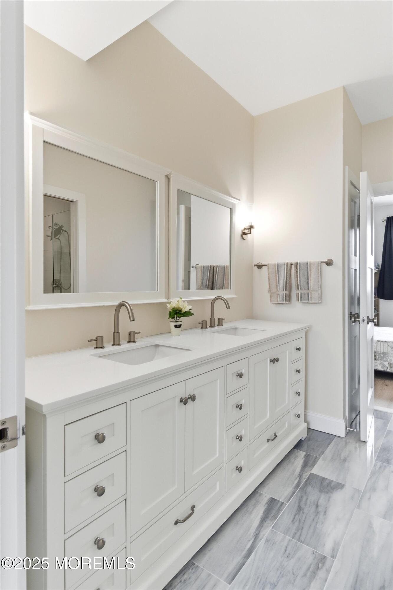 7 East Lavenia Avenue Beach Haven, NJ 08008 - Photo 28 of 48 a bathroom with double sink and a mirror